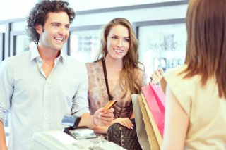 a few investing in products in a department store