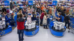 consumers summary their vacation shopping during Walmart's Ebony Friday activities on Thursday, Nov. 27, 2014 in Bentonville, Ark.
