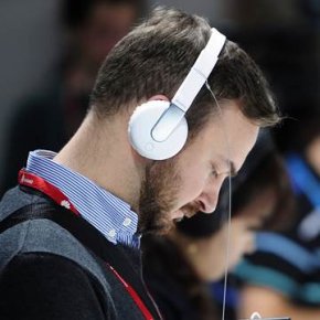 picture: a person listens to music.