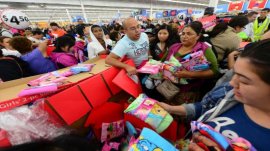 People get an early start on Black Friday shopping deals last year at a Walmart Superstore in Rosemead, Calif.