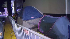 Shoppers camped outside an ideal Buy in Riverside on Nov. 23, 2015, to get Ebony Friday deals. (Credit: KTLA)