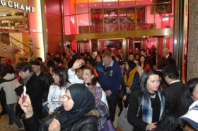 buyers rush into Macy's whenever doorways opened at 6 p.m. on Thursday.